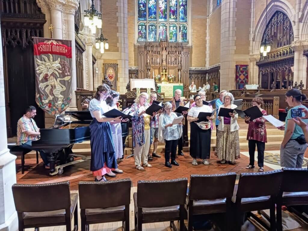 Saint Mary's choir members singing for the Pride Service 2024 at Saint Mark's Cathedral